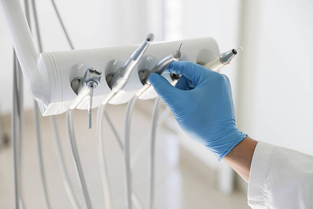 Professional Tooth Extraction technician working in Manassas city County, VA